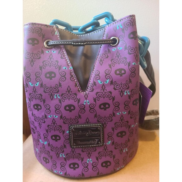 Loungefly Handbags - Disney Loungefly Haunted Mansion Wallpaper GITD Purple Drawstring Bucket Bag NEW